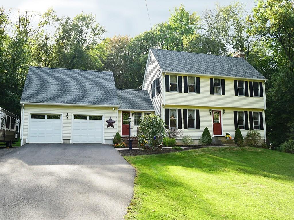 82 Gilbert Road Stafford, CT 06076 - Photo 1 of 1 a front view of a house with a yard porch and sitting area