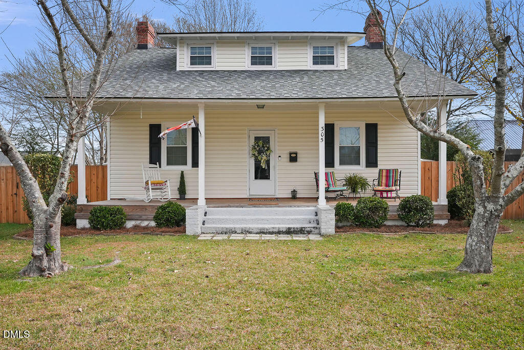 305 South 17th Street Erwin, NC 28339 - Photo 2 of 35 a view of a house with a yard