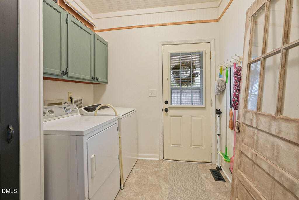 305 South 17th Street Erwin, NC 28339 - Photo 29 of 35 a utility room with a sink dryer and washer