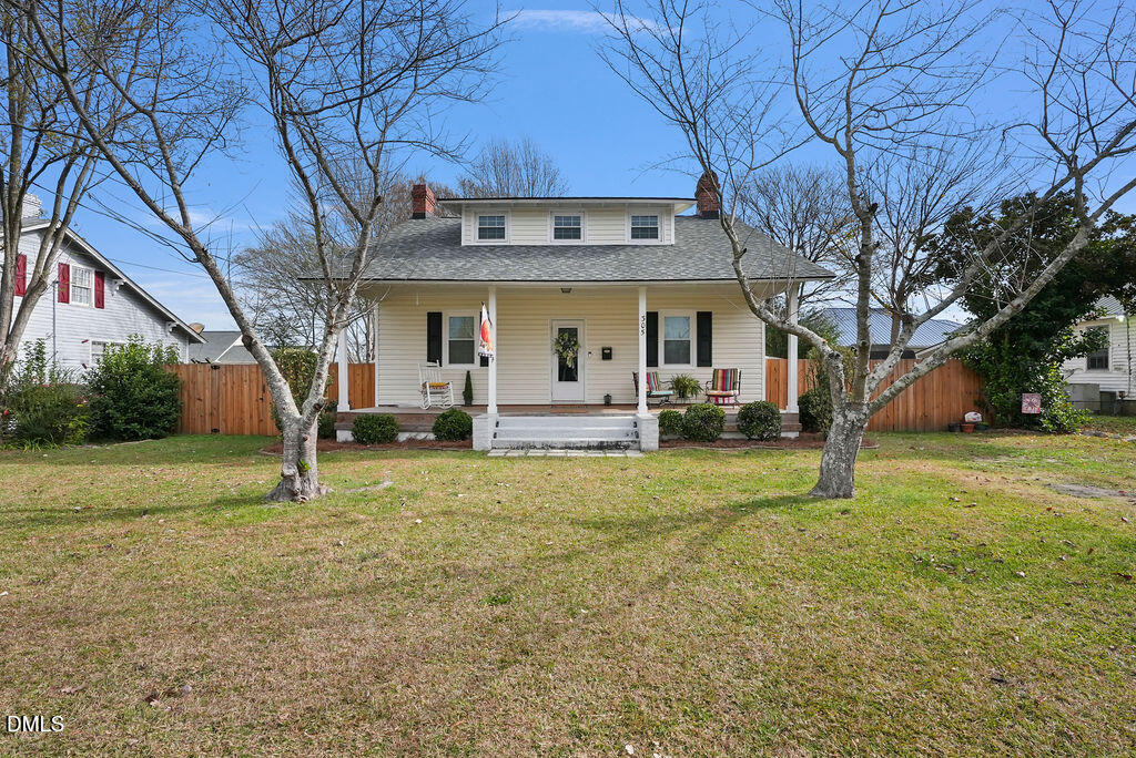 305 South 17th Street Erwin, NC 28339 - Photo 3 of 35 a house view with a garden space