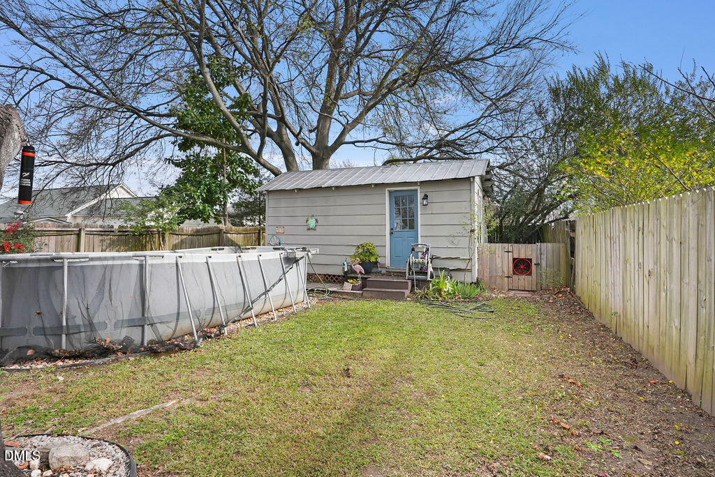 305 South 17th Street Erwin, NC 28339 - Photo 34 of 35 a view of a house with backyard and sitting area
