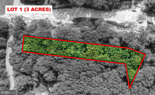 a view of a sign board with wooden fence