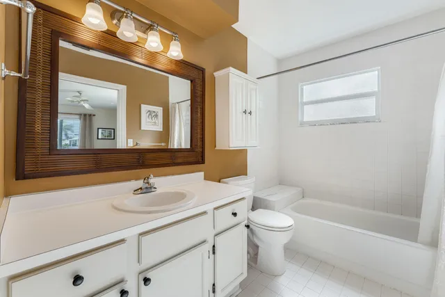 a view of an empty room with a balcony