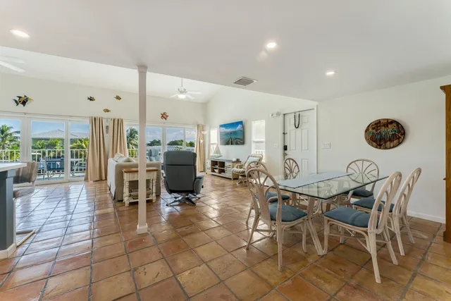 a kitchen with stainless steel appliances granite countertop a sink and a stove