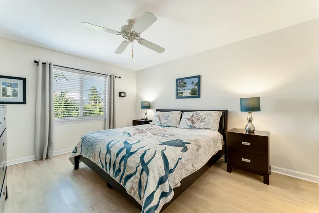 a bathroom with a sink vanity granite and a mirror