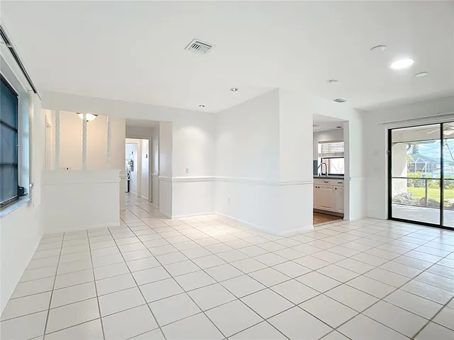 a view of an empty room and window