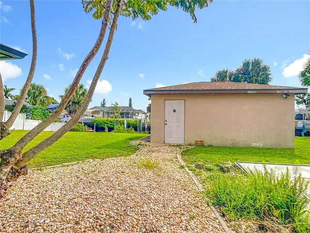 a backyard of a house with lots of green space