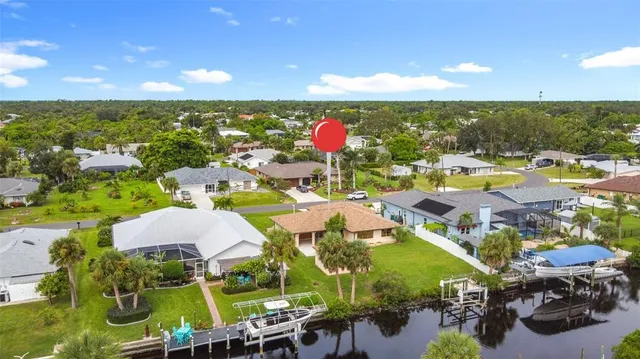 a view of swimming pool with outdoor seating and yard