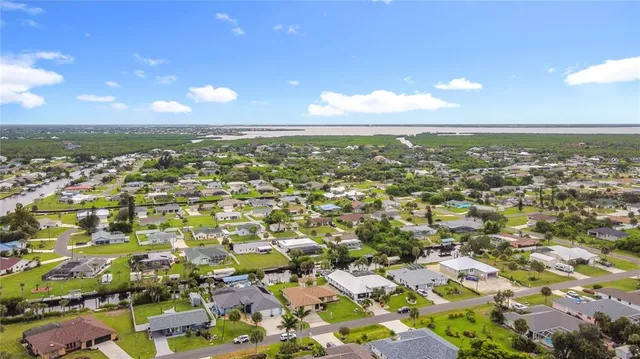 an aerial view of residential building with outdoor space