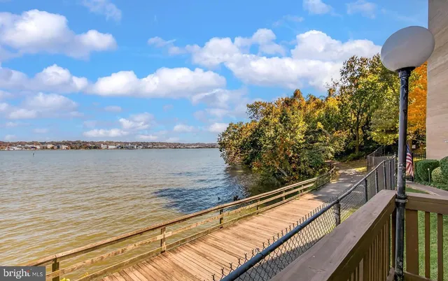 a view of swimming pool from a balcony