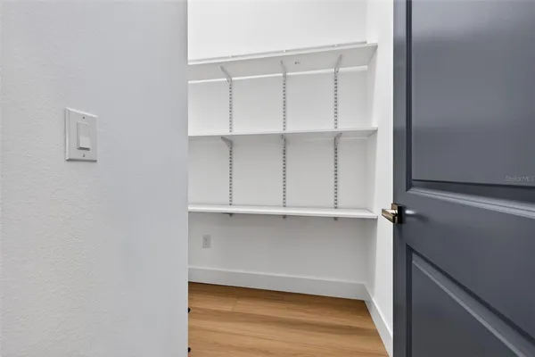 a view of an empty walk in closet