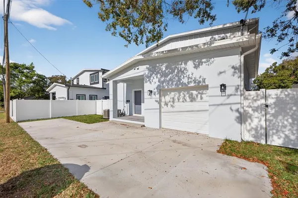 a view of residential houses with outdoor space
