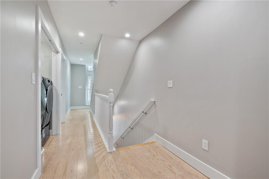 172 43rd Street Pittsburgh, PA 15201 - Photo 14 of 25 a view of a livingroom with white walls and stairs