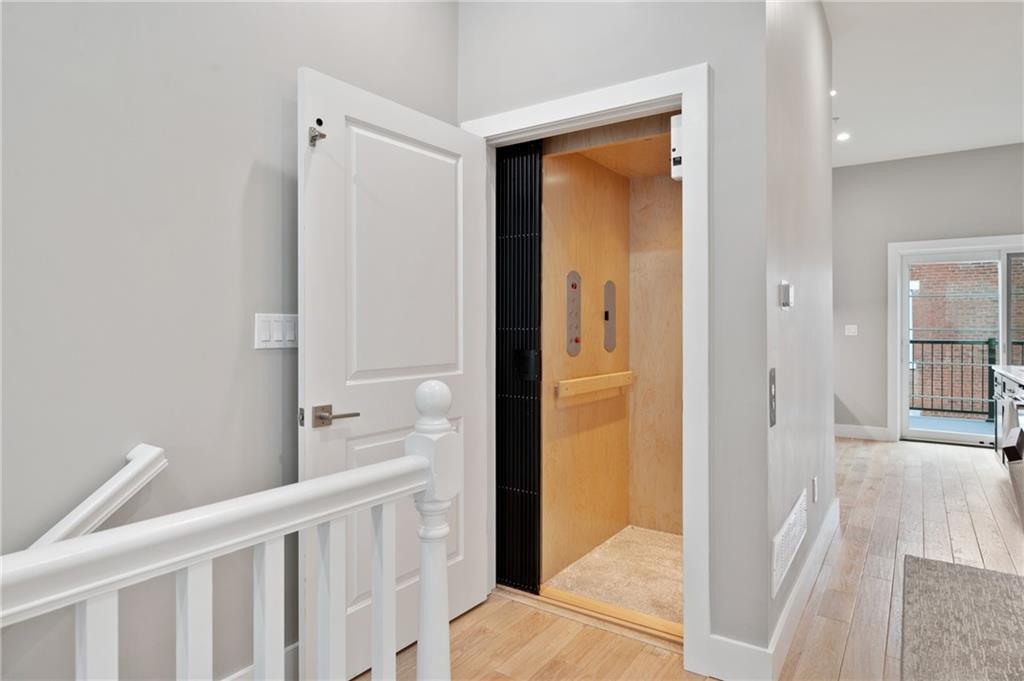 172 43rd Street Pittsburgh, PA 15201 - Photo 2 of 25 a view of a hallway with a livingroom and a bathroom with sink