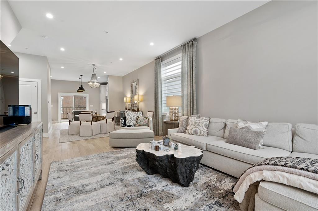 172 43rd Street Pittsburgh, PA 15201 - Photo 9 of 25 a living room with furniture and a large window