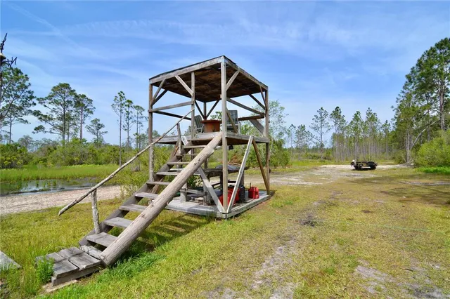 a view of a park with a slide