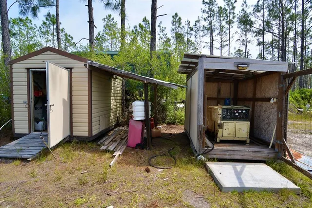 a view of a lake with a yard