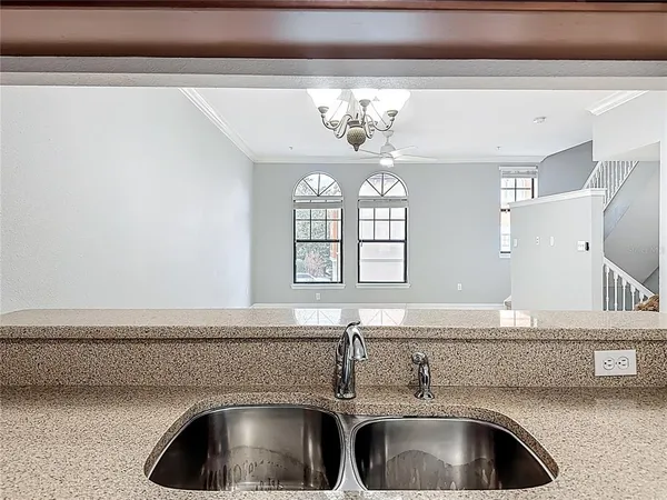 a bathroom with a sink a mirror and vanity