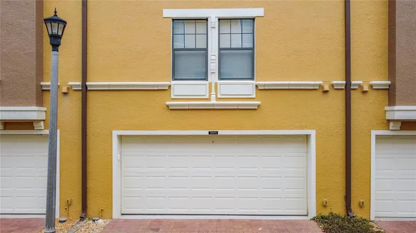 a view of a door and a window