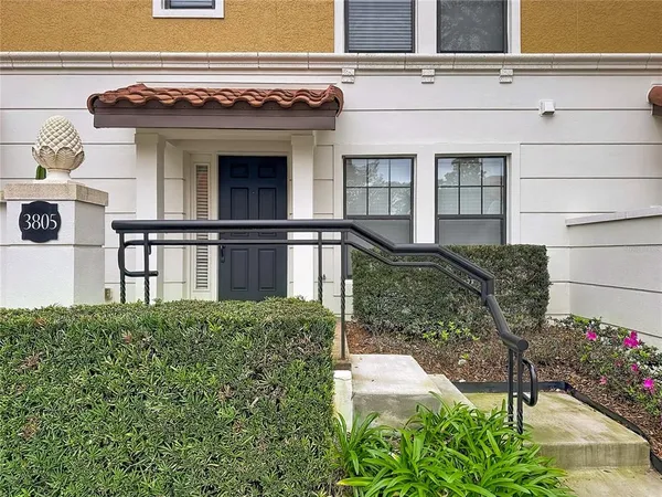 a view of a house with a small porch