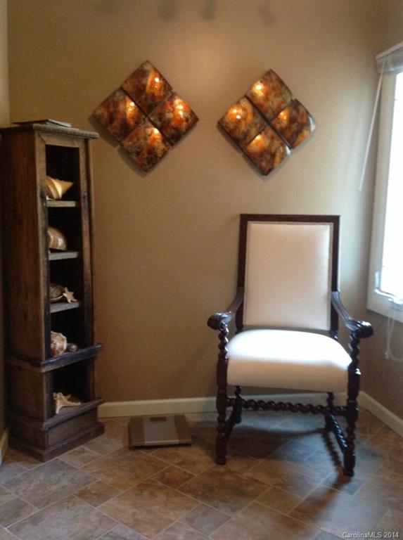 4421 Rounding Run Road Charlotte, NC 28277 - Photo 11 of 17 a bedroom with a bed and cabinets