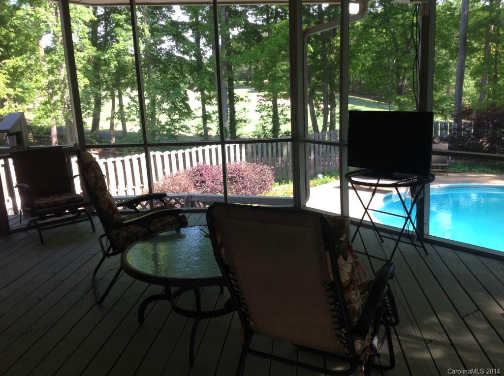 4421 Rounding Run Road Charlotte, NC 28277 - Photo 15 of 17 a view of balcony with wooden floor and outdoor seating