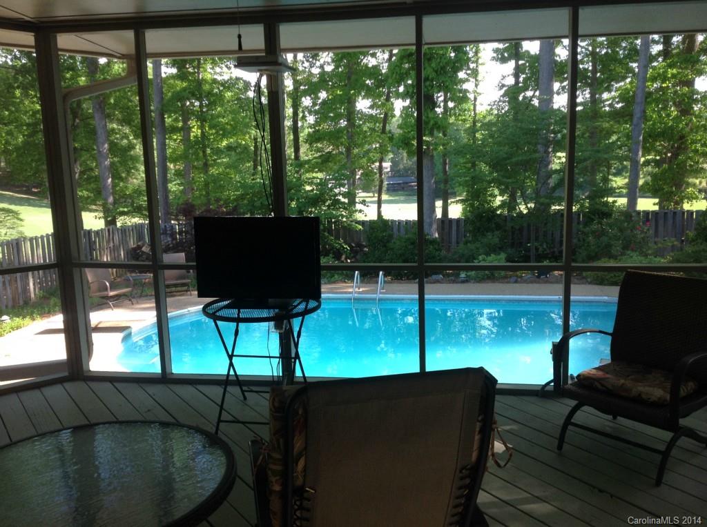 4421 Rounding Run Road Charlotte, NC 28277 - Photo 16 of 17 a living room with couches chair and a table