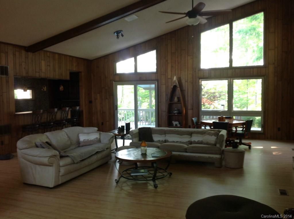 4421 Rounding Run Road Charlotte, NC 28277 - Photo 3 of 17 a living room with fireplace furniture and a large window