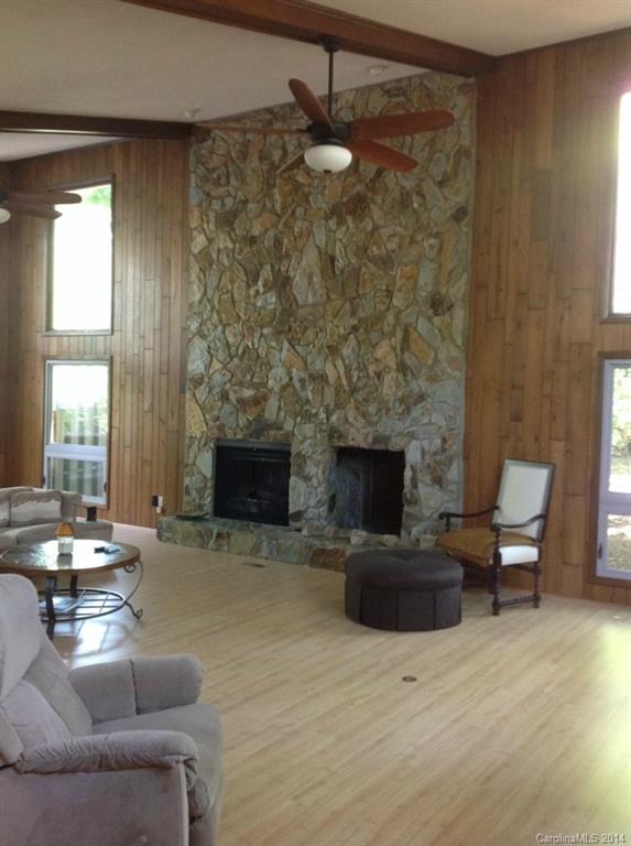 4421 Rounding Run Road Charlotte, NC 28277 - Photo 5 of 17 a living room with furniture and a fireplace