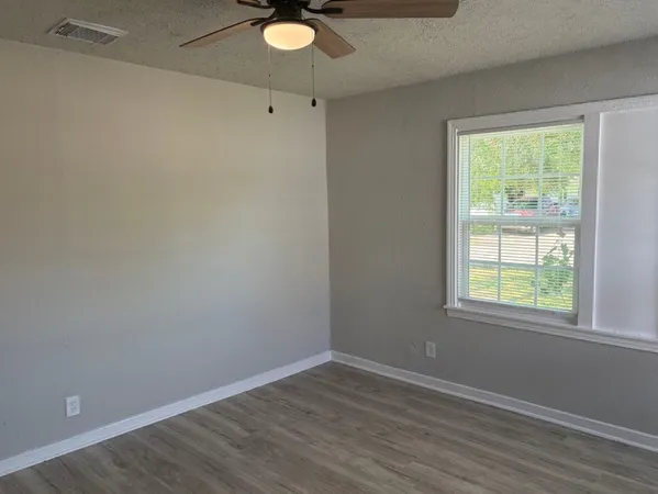 an empty room with window