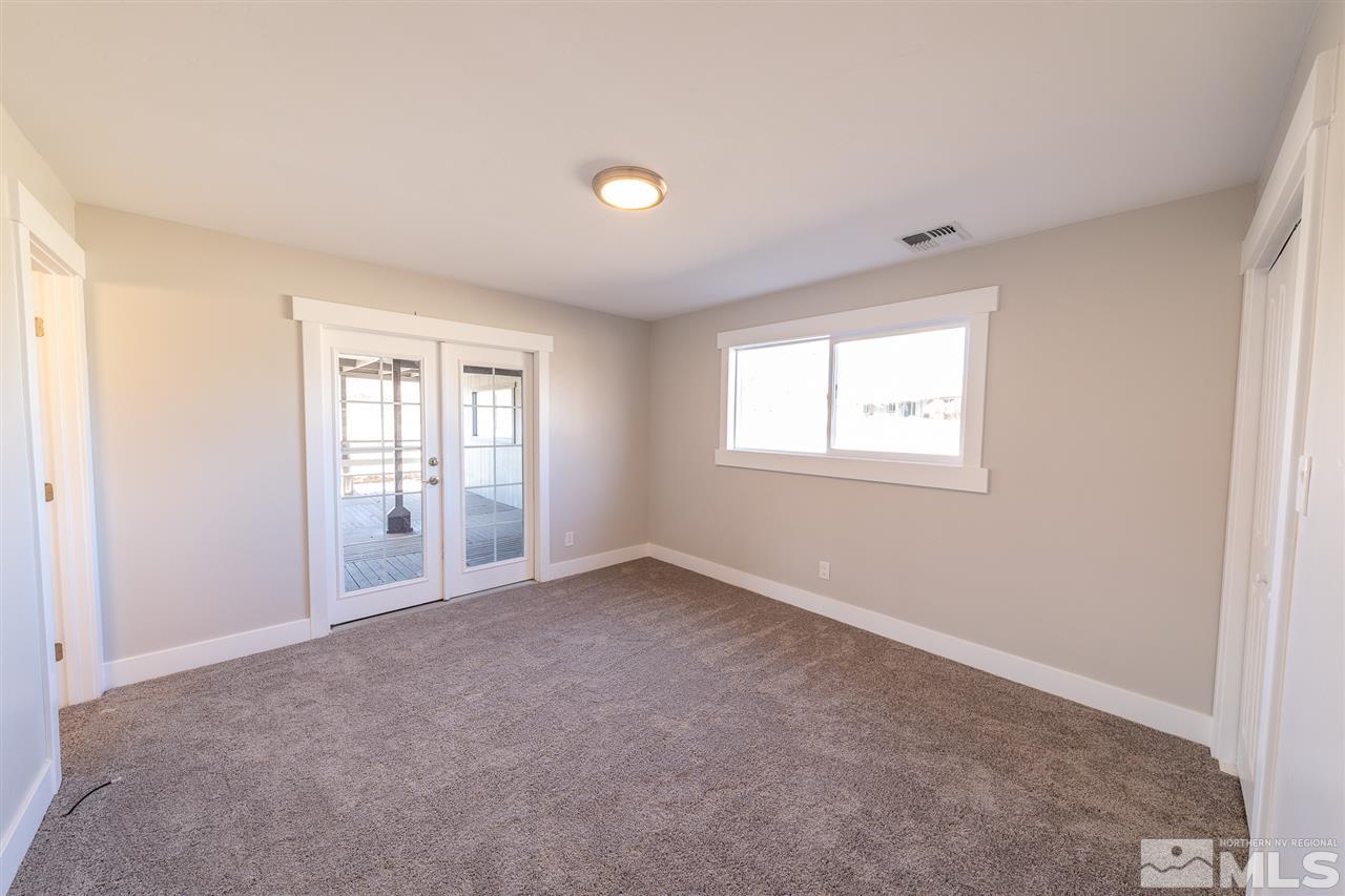 1070 Foothill Road Reno, NV 89511 - Photo 9 of 17 a view of an empty room with a window