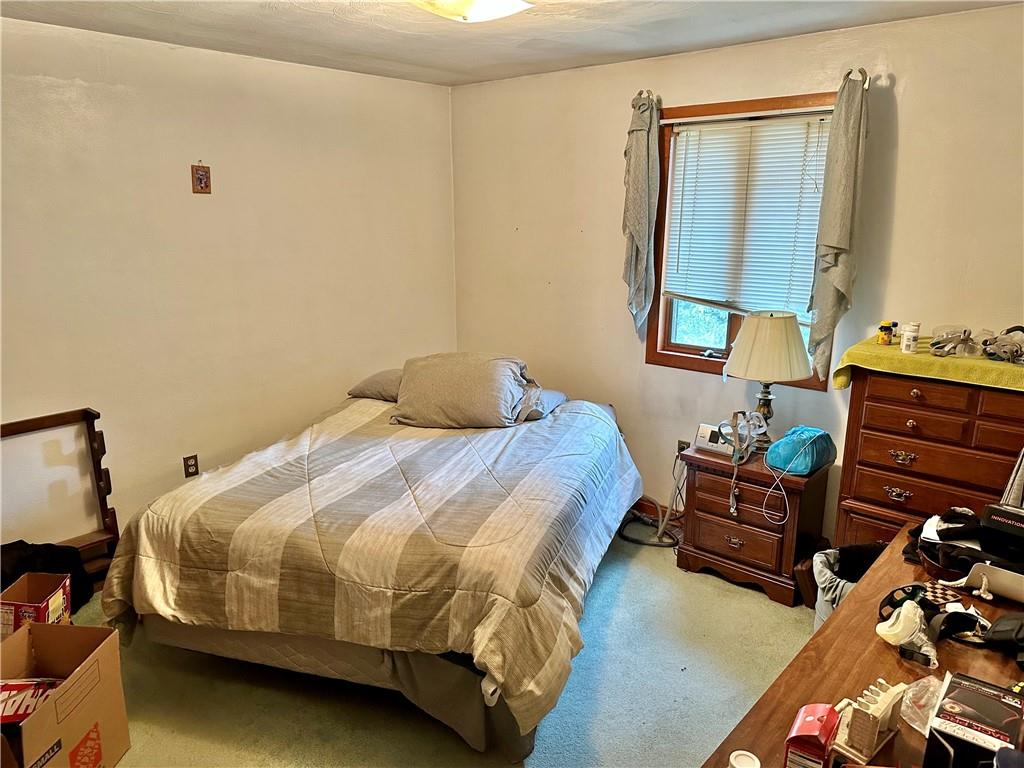 230 Chapel Road Beaver, PA 15009 - Photo 13 of 23 a bedroom with a bed and a mirror