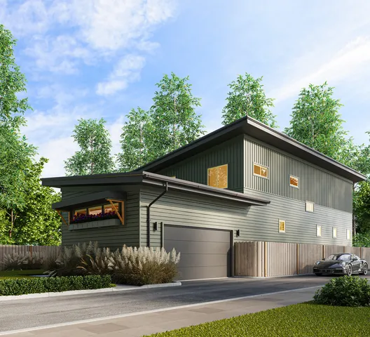 a view of a house with a yard and garage