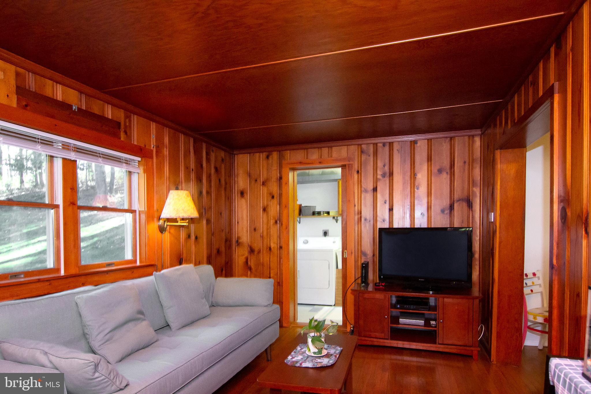 623 Bear Branch Road Westminster, MD 21157 - Photo 11 of 64 Living Room has knotty pine panelling