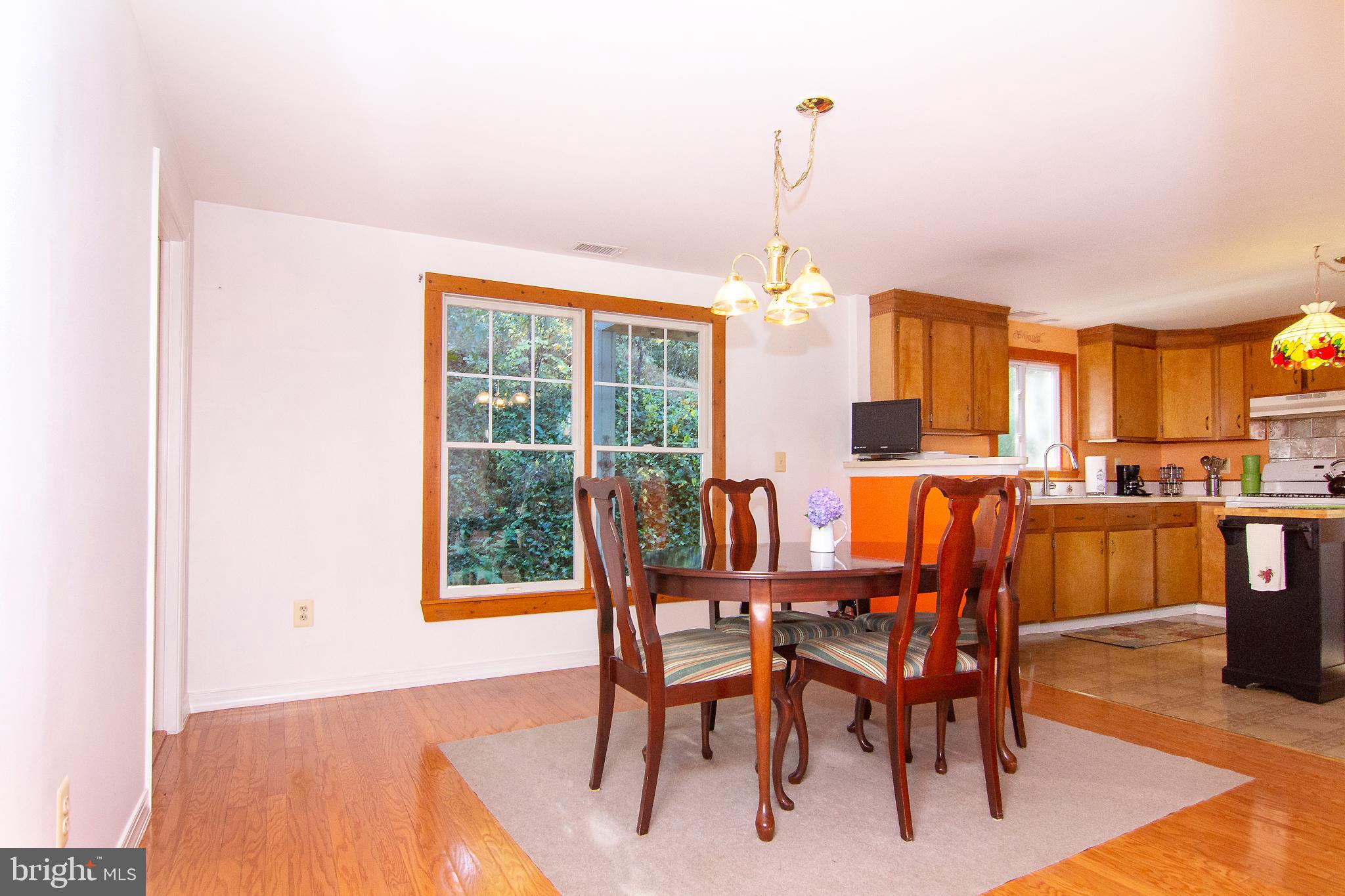 623 Bear Branch Road Westminster, MD 21157 - Photo 16 of 64 Dining Room off Kitchen has wood floors