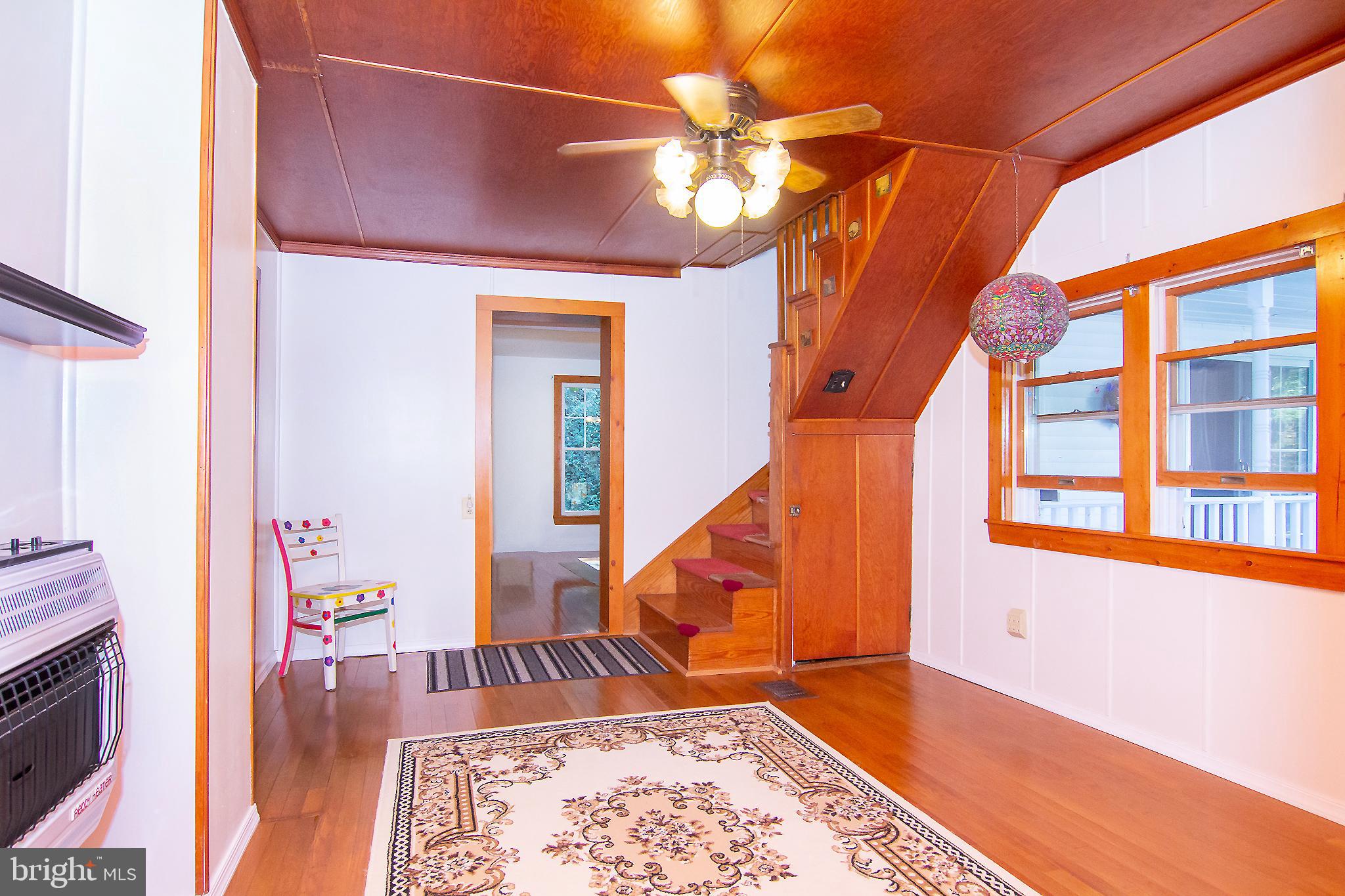 623 Bear Branch Road Westminster, MD 21157 - Photo 24 of 64 Family Room with wood floors, ceiling fan