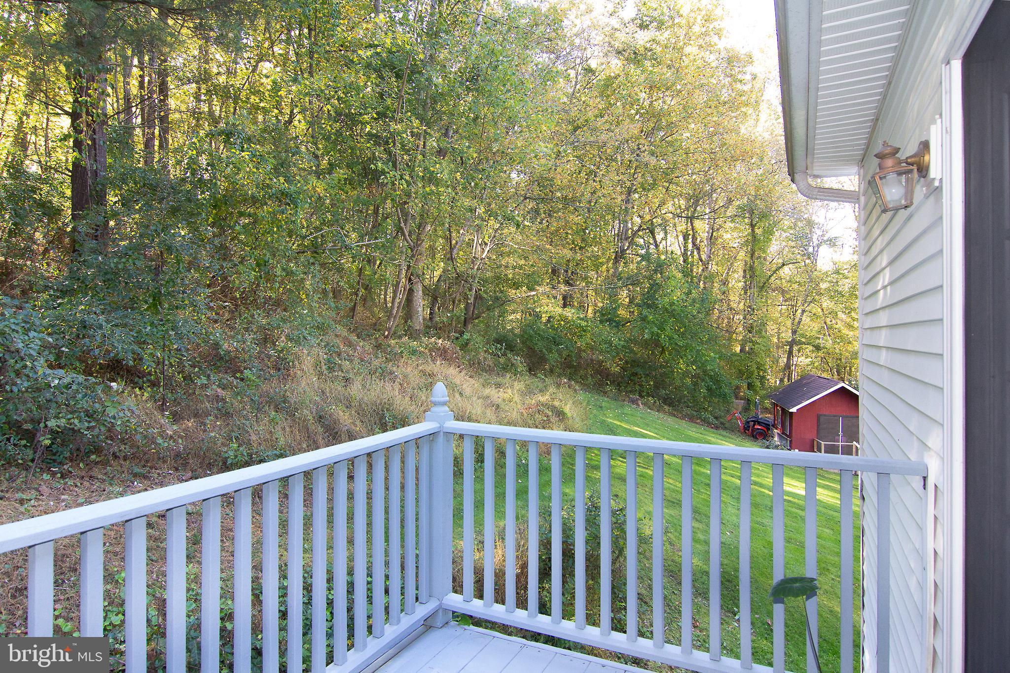 623 Bear Branch Road Westminster, MD 21157 - Photo 31 of 64 View of back yard from deck off Primary BR