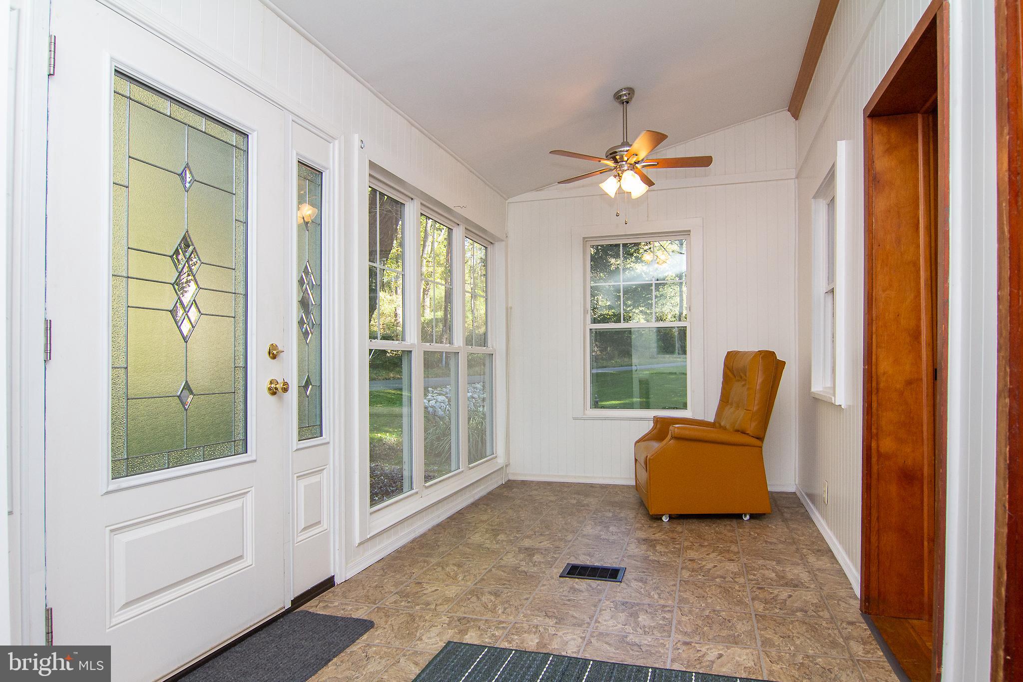 623 Bear Branch Road Westminster, MD 21157 - Photo 8 of 64 Front Sun Room with ceiling fan