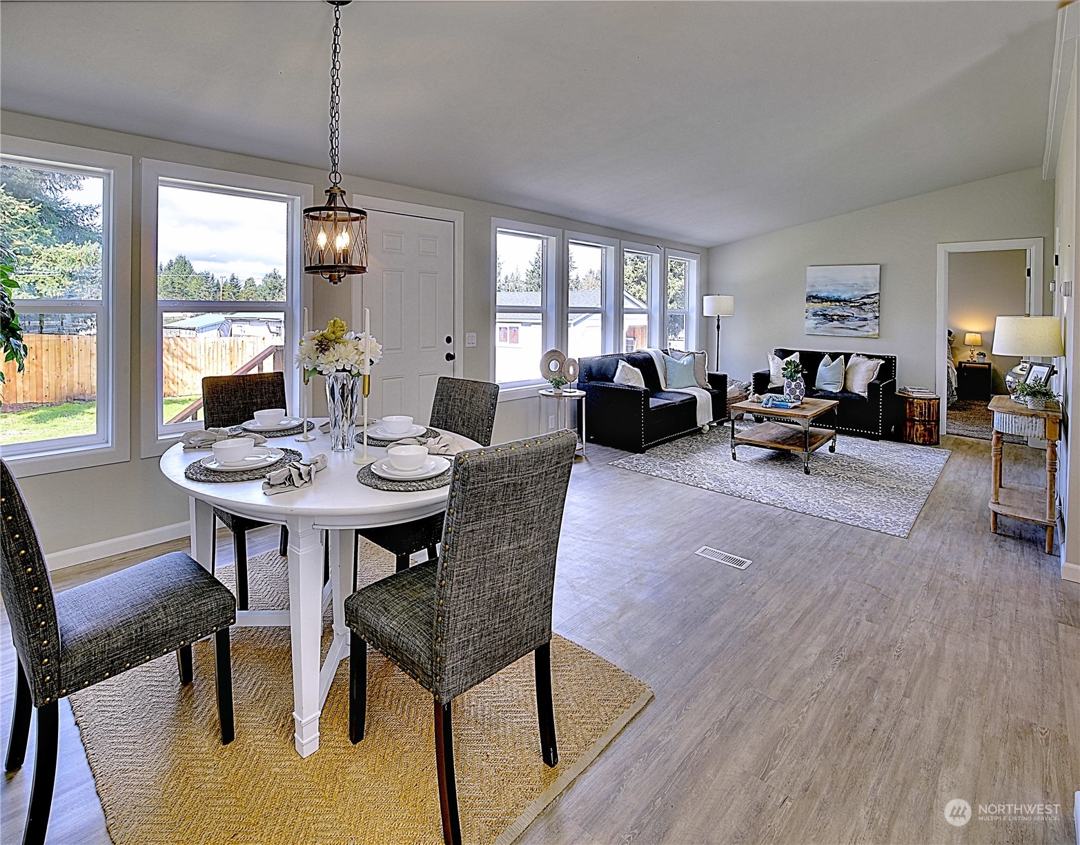 7230 196th Avenue Southwest Rochester, WA 98579 - Photo 21 of 39 a view of a dining room with furniture window and outside view