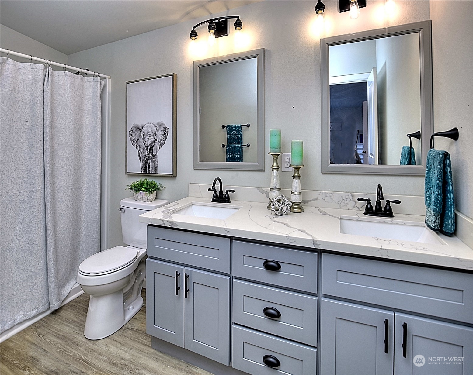7230 196th Avenue Southwest Rochester, WA 98579 - Photo 23 of 39 a bathroom with a granite countertop toilet sink and mirror