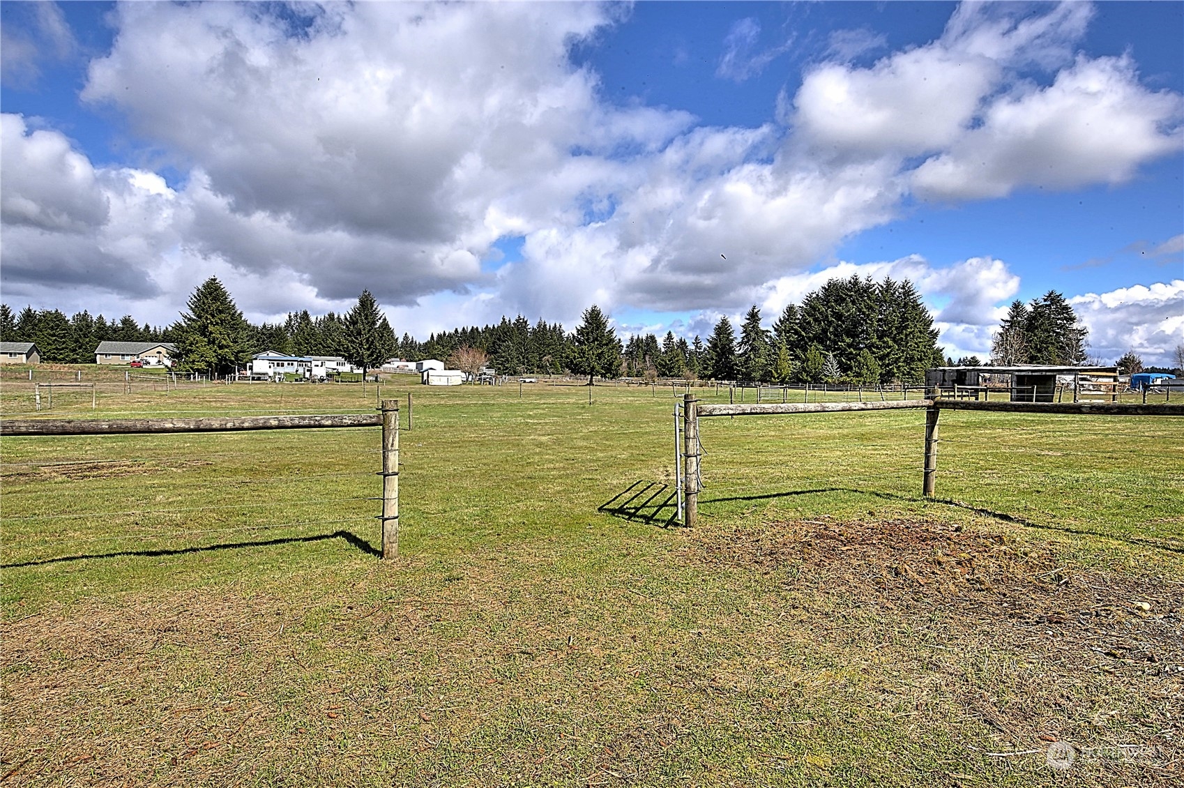 7230 196th Avenue Southwest Rochester, WA 98579 - Photo 5 of 39 a view of a lake with a big yard
