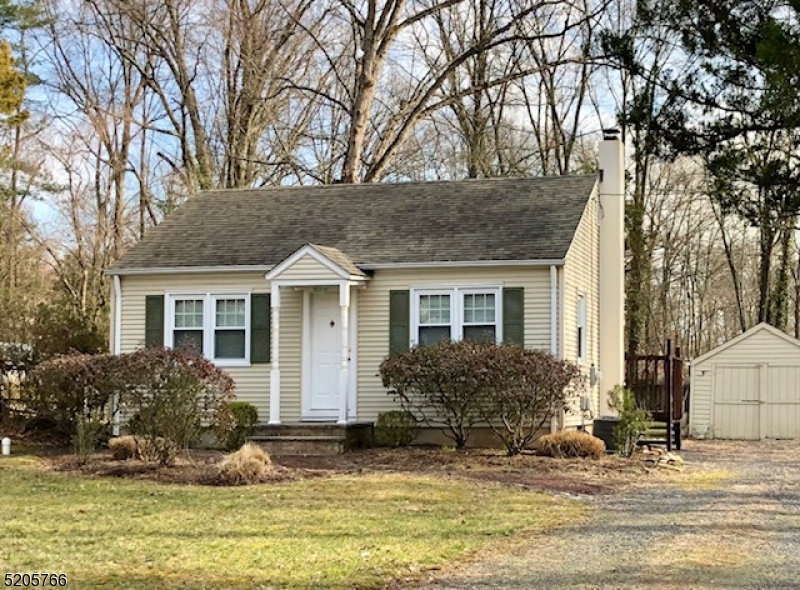 830 Bluestone Lane Bridgewater, NJ 08807 - Photo 1 of 29 a front view of house with yard and trees around