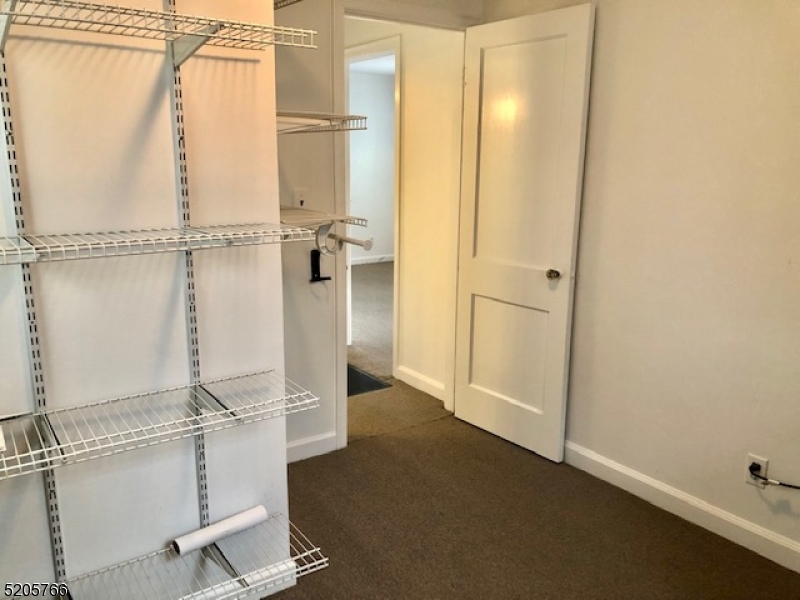 830 Bluestone Lane Bridgewater, NJ 08807 - Photo 19 of 29 a view of a room with rack on the wall