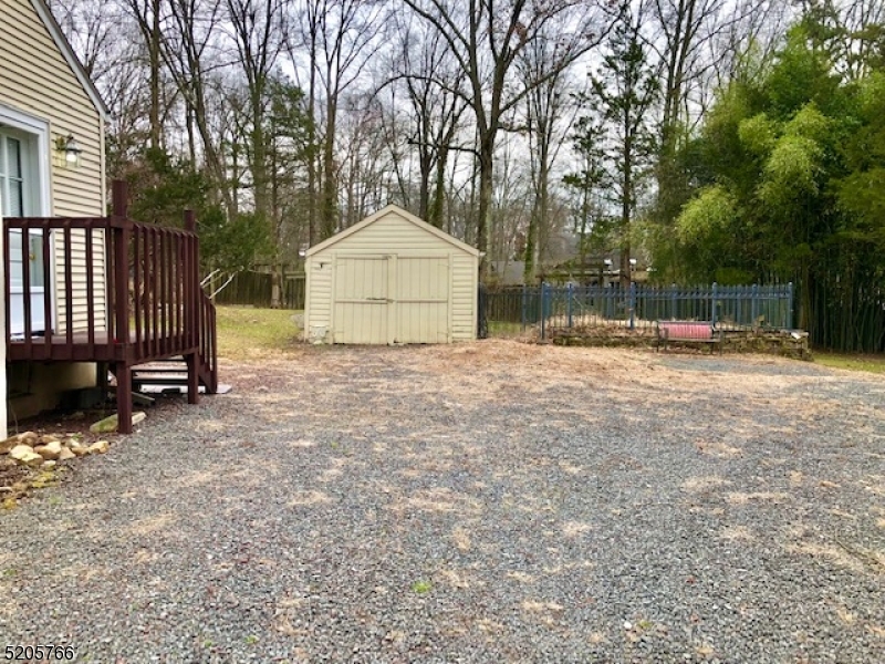 830 Bluestone Lane Bridgewater, NJ 08807 - Photo 26 of 29 a view of a house with a yard and large tree
