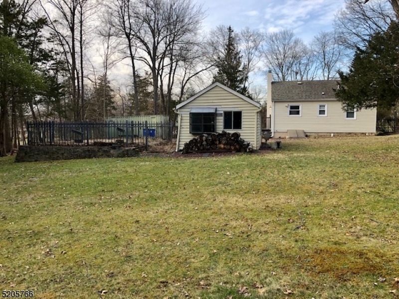 830 Bluestone Lane Bridgewater, NJ 08807 - Photo 27 of 29 a front view of a house with a yard