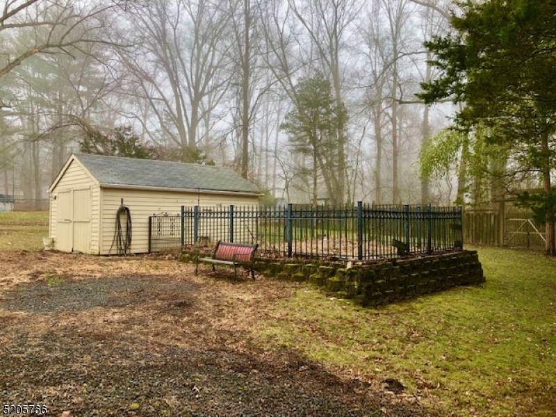 830 Bluestone Lane Bridgewater, NJ 08807 - Photo 28 of 29 a view of a house with backyard and trees