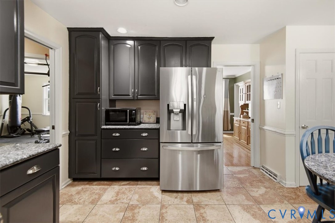 4508 Ridgecrest Lane Colonial Heights, VA 23834 - Photo 16 of 52 Kitchen featuring dark cabinetry, stainless steel