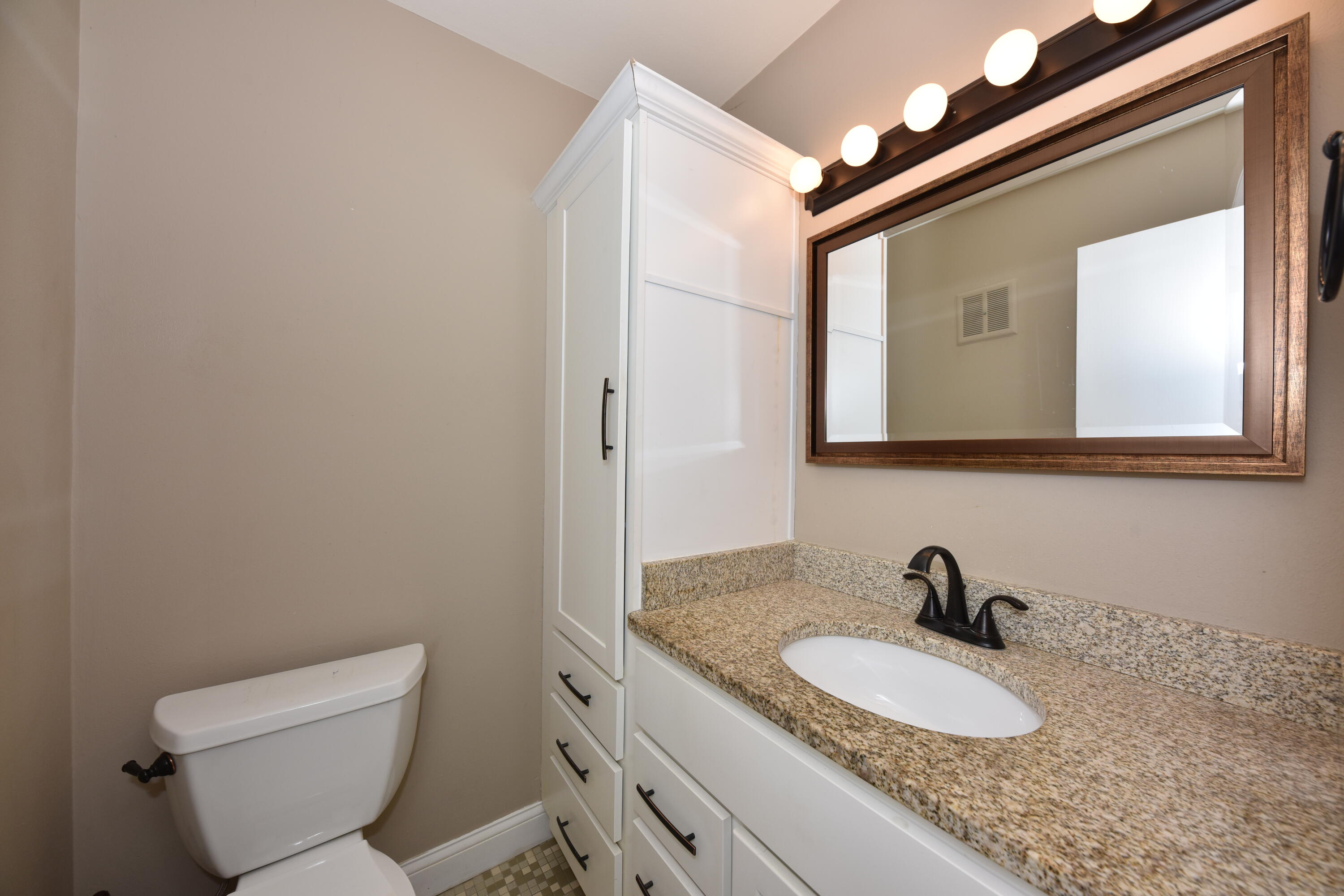 3935 South 84th Street, Unit 4 Greenfield, WI 53228 - Photo 11 of 24 Half Bath off Master Bedroom