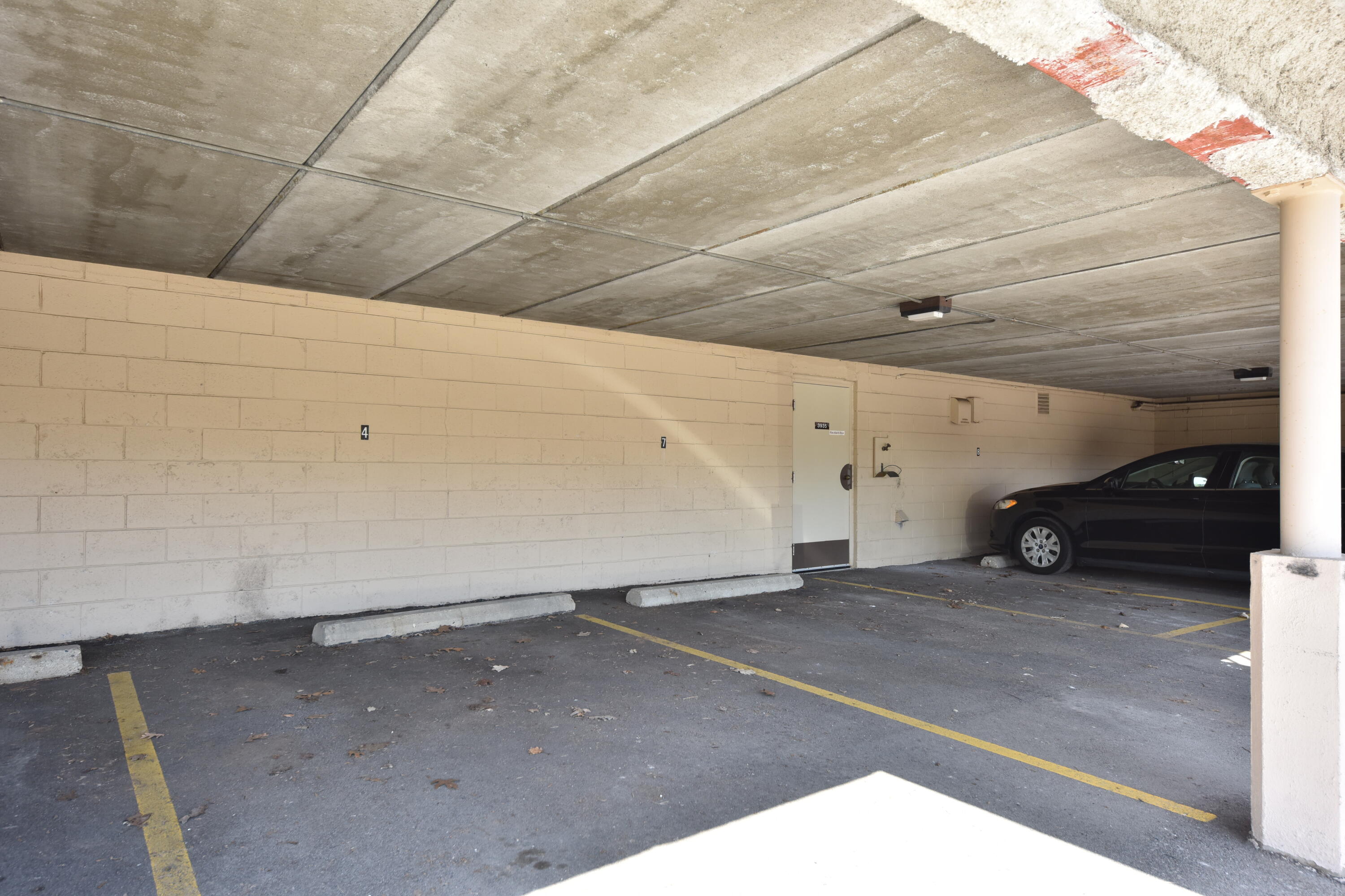 3935 South 84th Street, Unit 4 Greenfield, WI 53228 - Photo 21 of 24 Designated Covered Parking Spot