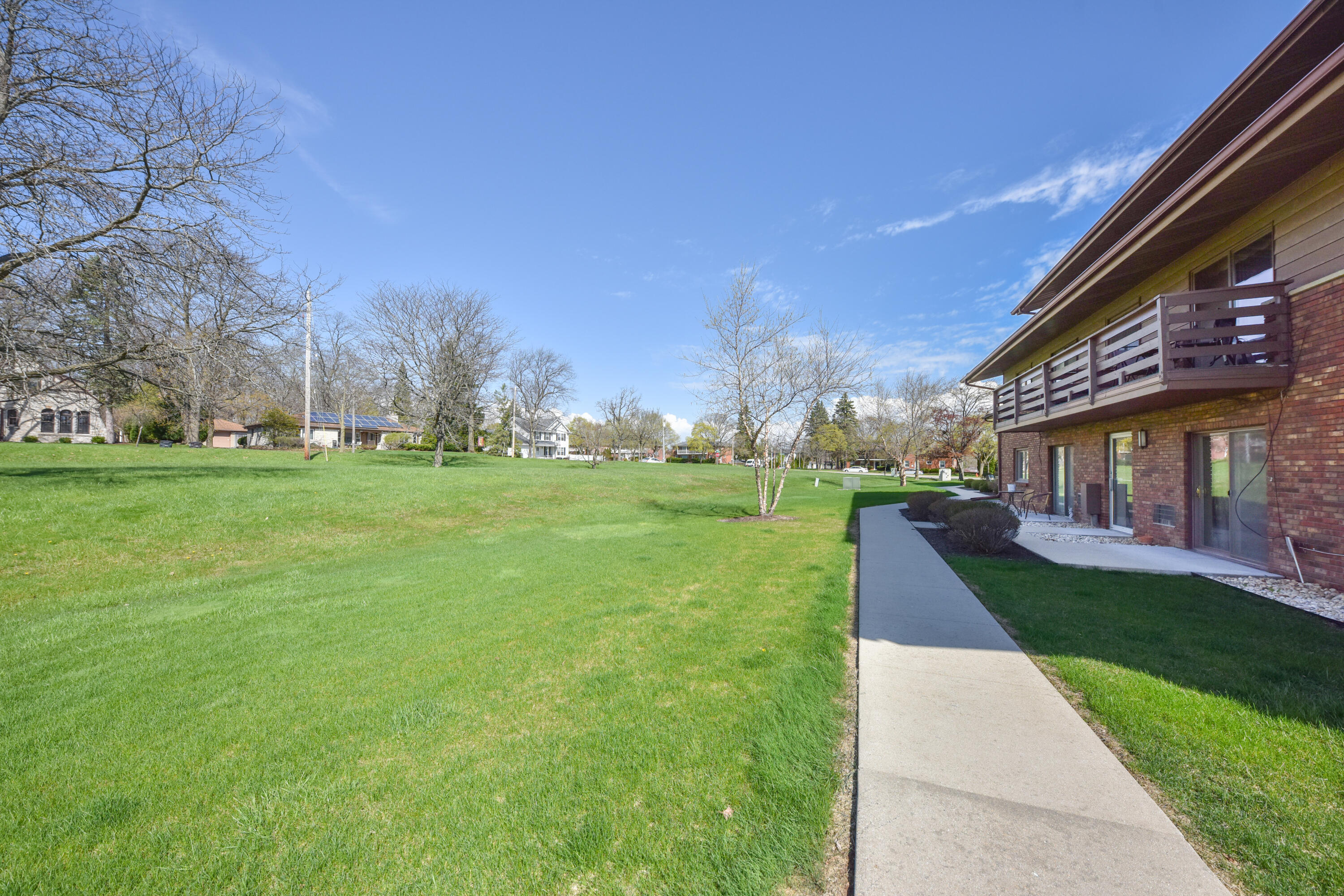 3935 South 84th Street, Unit 4 Greenfield, WI 53228 - Photo 24 of 24 Greenspace beyond patio
